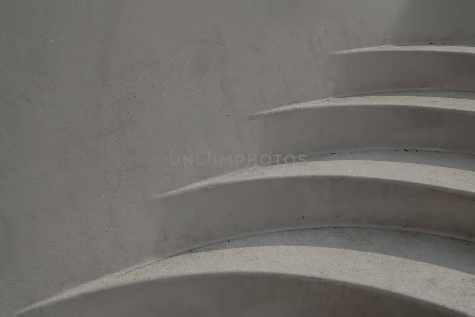 Architecture stairway design pattern often seen on monuments and landmarks, Abstract steps, Cemented stairs, Space for text, Selective Focus.