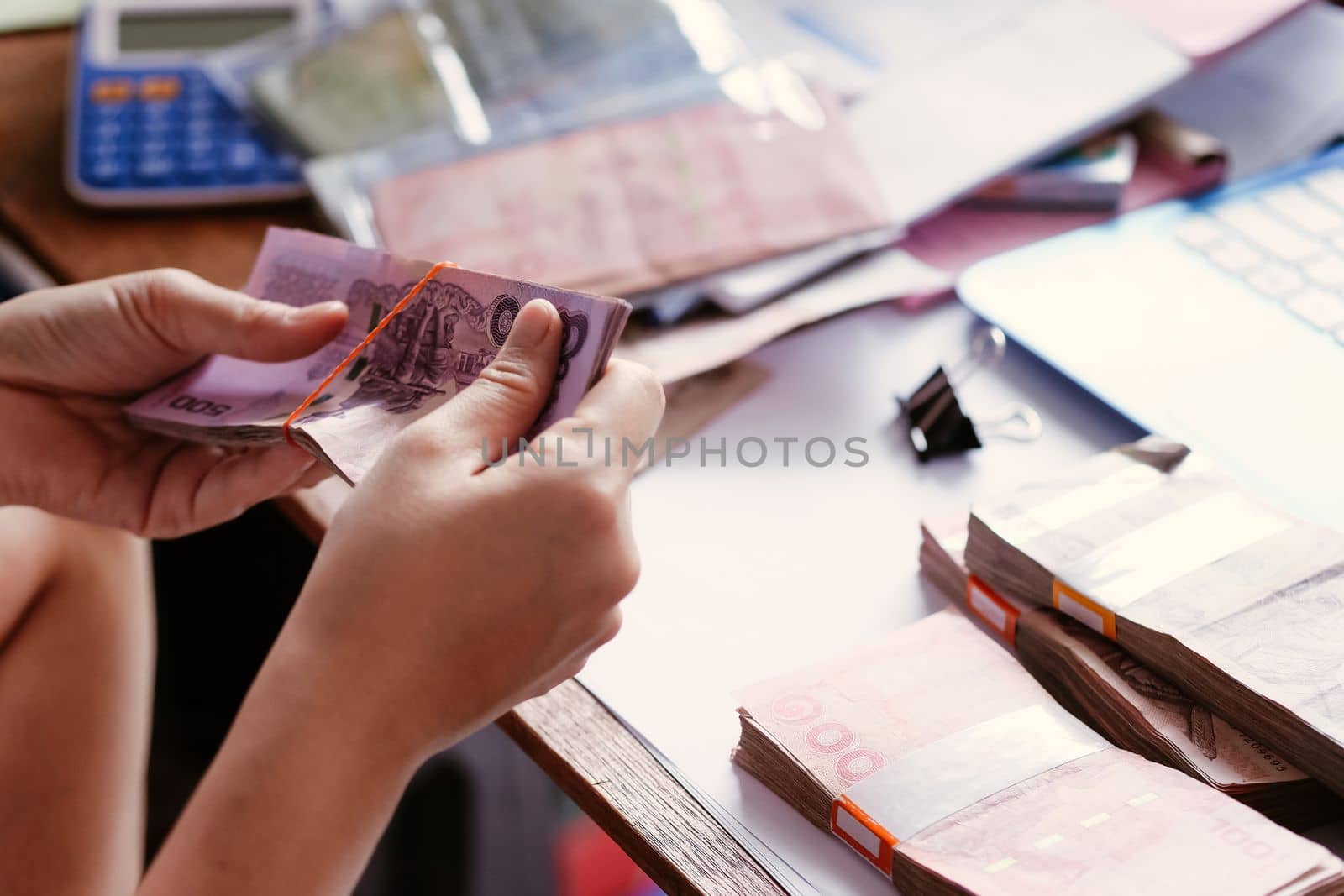 close up image of female hand count the money, business accounting background