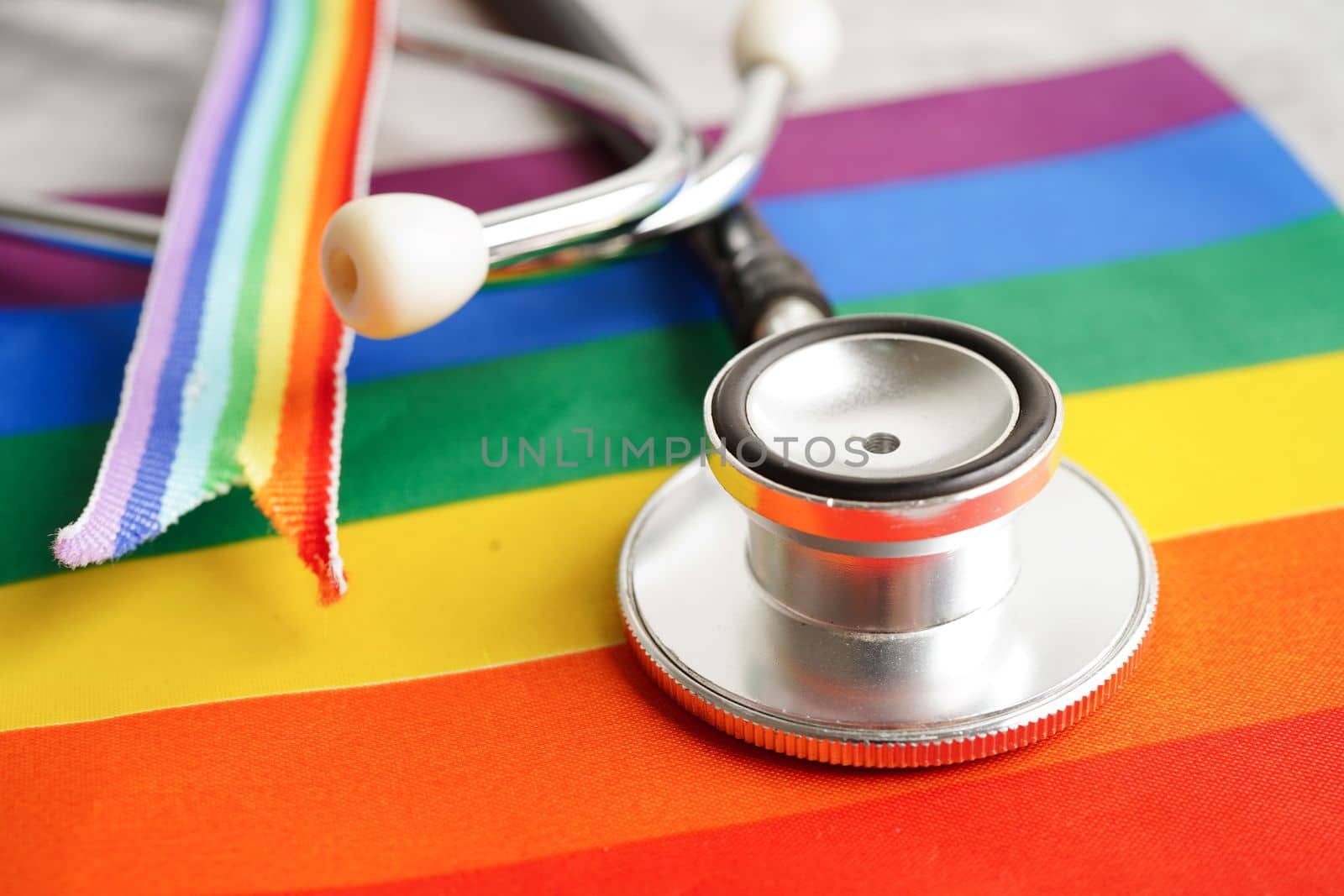 LGBT symbol, Stethoscope with rainbow ribbon, rights and gender equality, LGBT Pride Month in June. by sweettomato