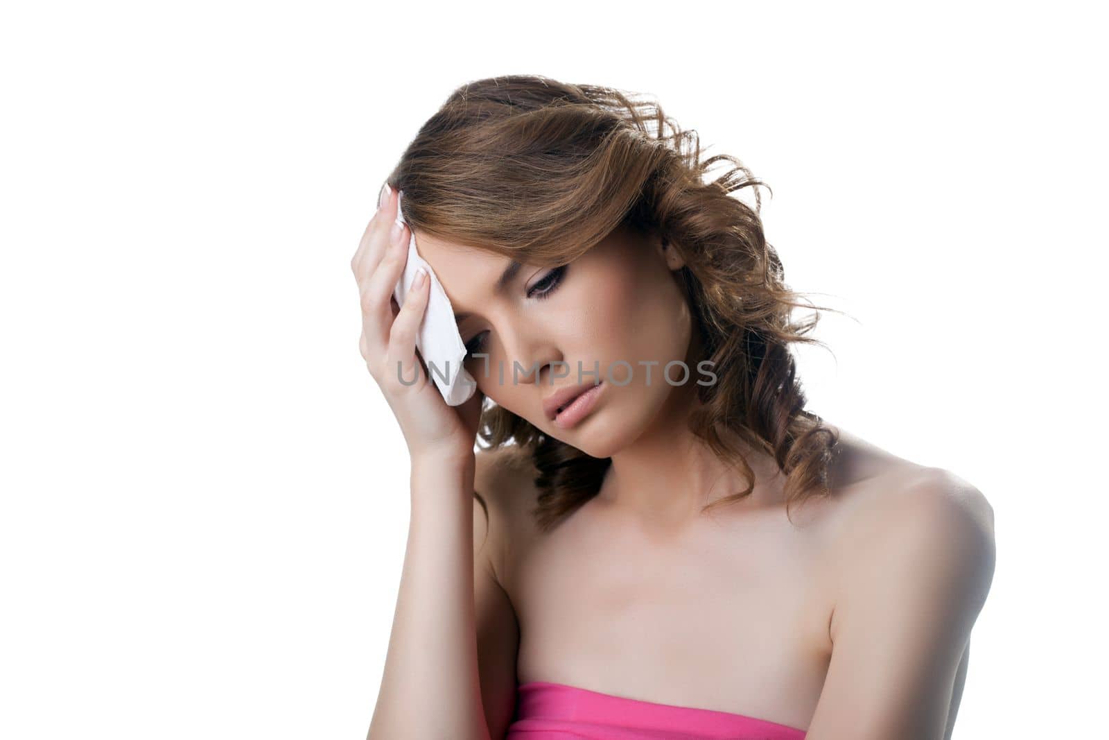 Woman having headache illness with kerchief. Isolated on white