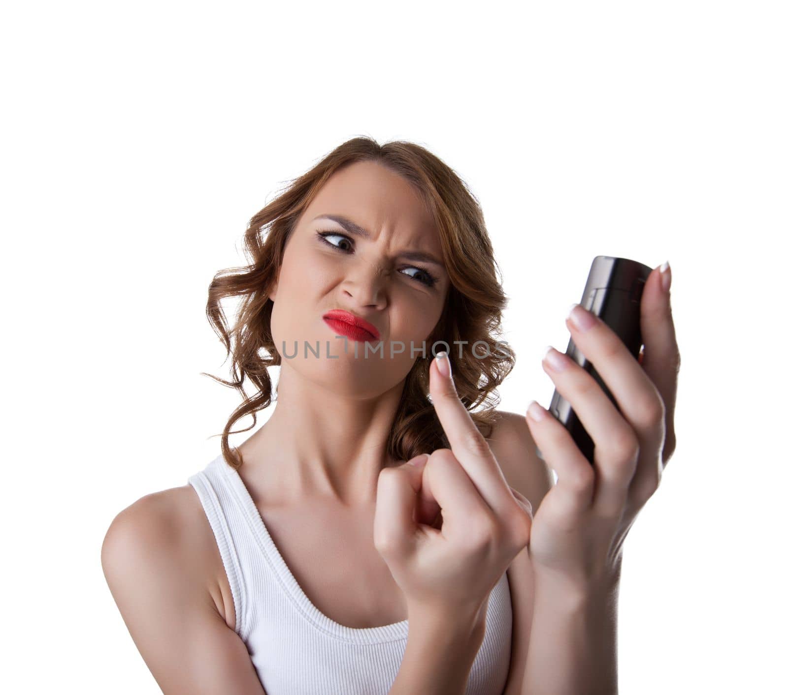 Anger Young woman show fuck finger on cell phone isolated