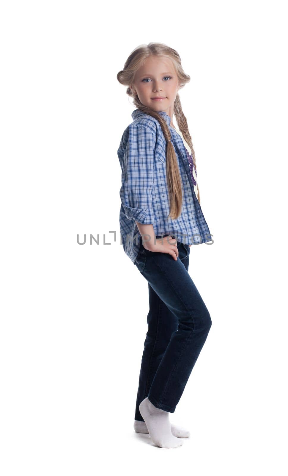 Full length portrait of beautiful girl in jeans. Isolated on white