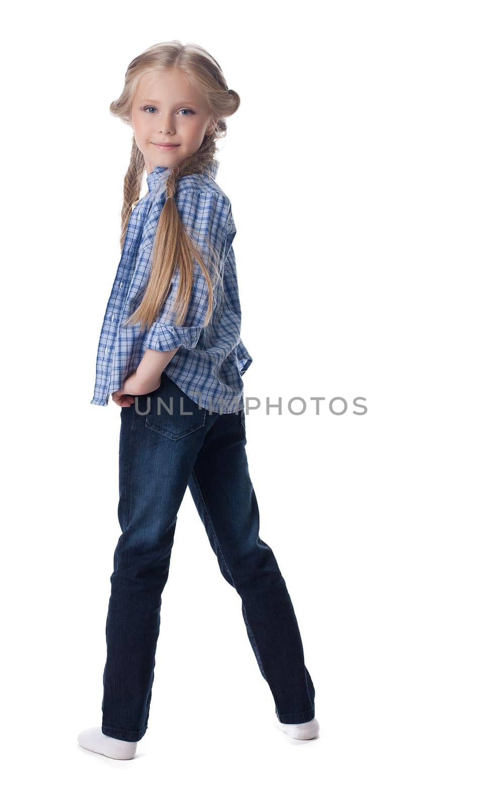 Full length portrait of beautiful girl in jeans. Isolated on white