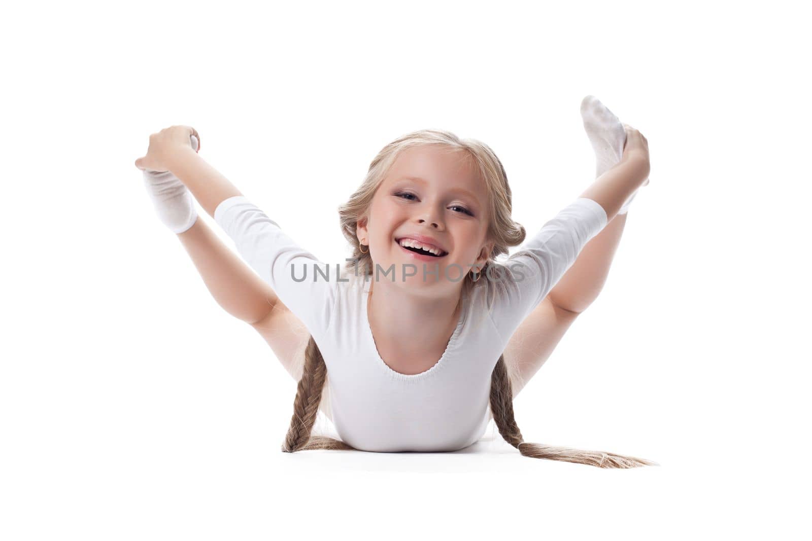 Full length portrait of kid gymnast. Isolated on white