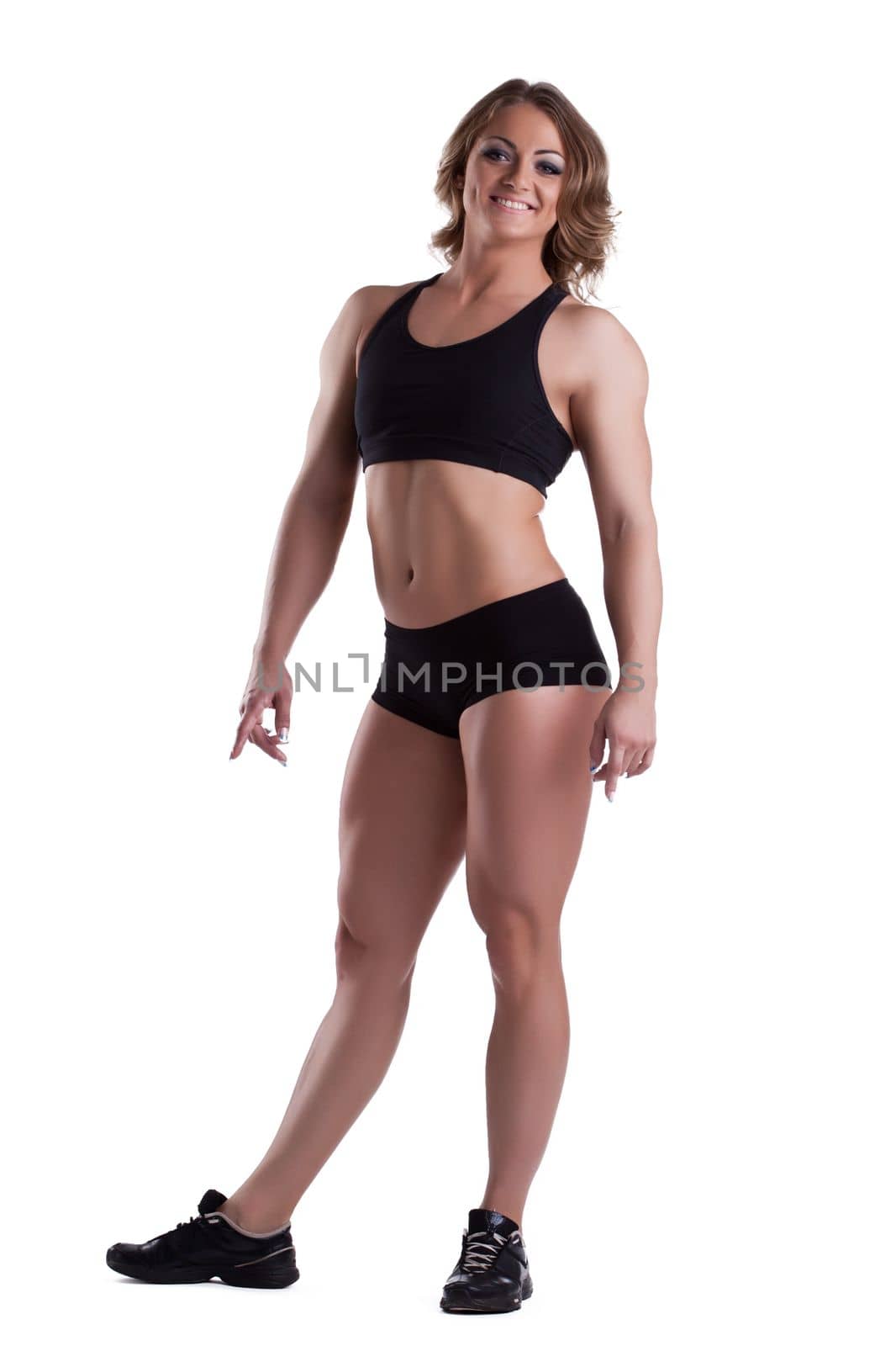 Beauty athletic woman full height body builder isolated