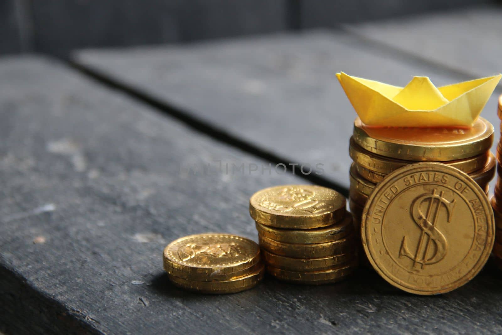 Business growth success process. Golden coins on vintage background.