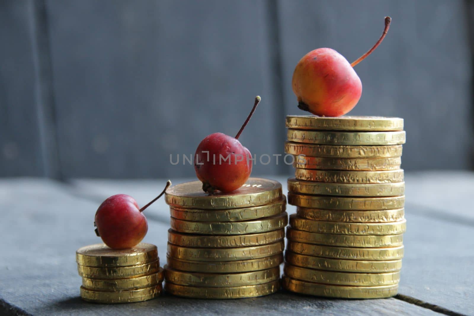 Golden coins raising chart. Diagram with golden coins money. by Markgraf