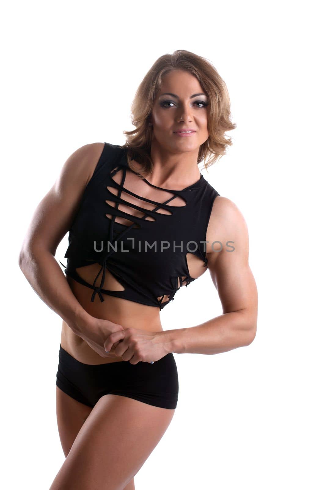 Athletic beauty woman bodybuilder in fashion training cloth isolated