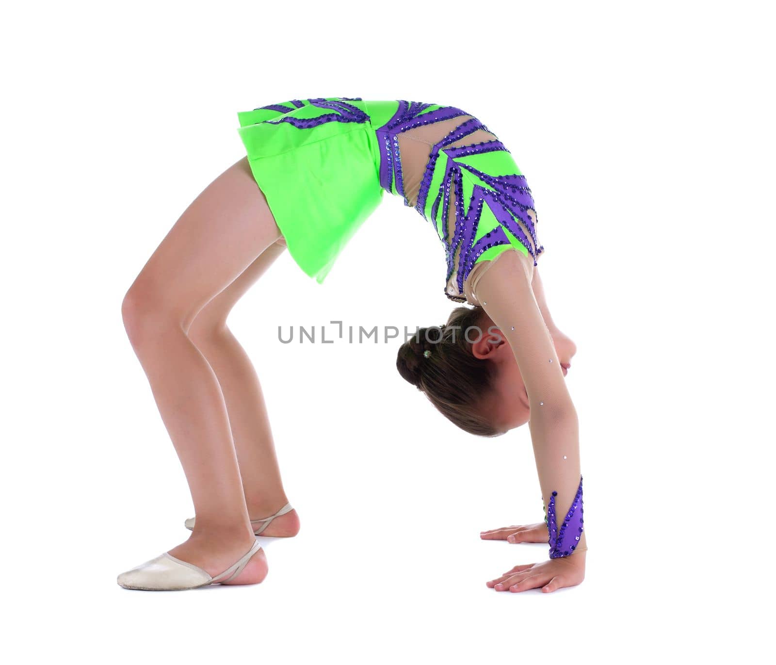 kid gymnast stand in bridge pose isolated - green suit