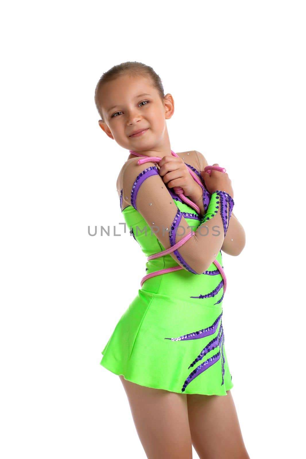 small Girl portrait posing in green costume - young gymnast isolated