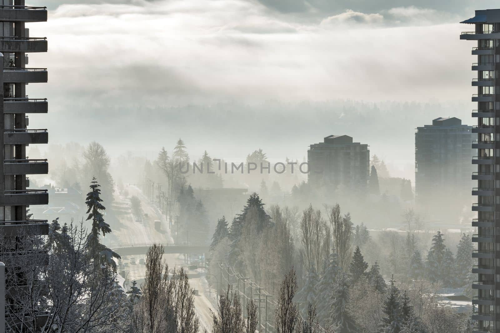 Cityscape in winter season. City on foggy winter morning in Canada