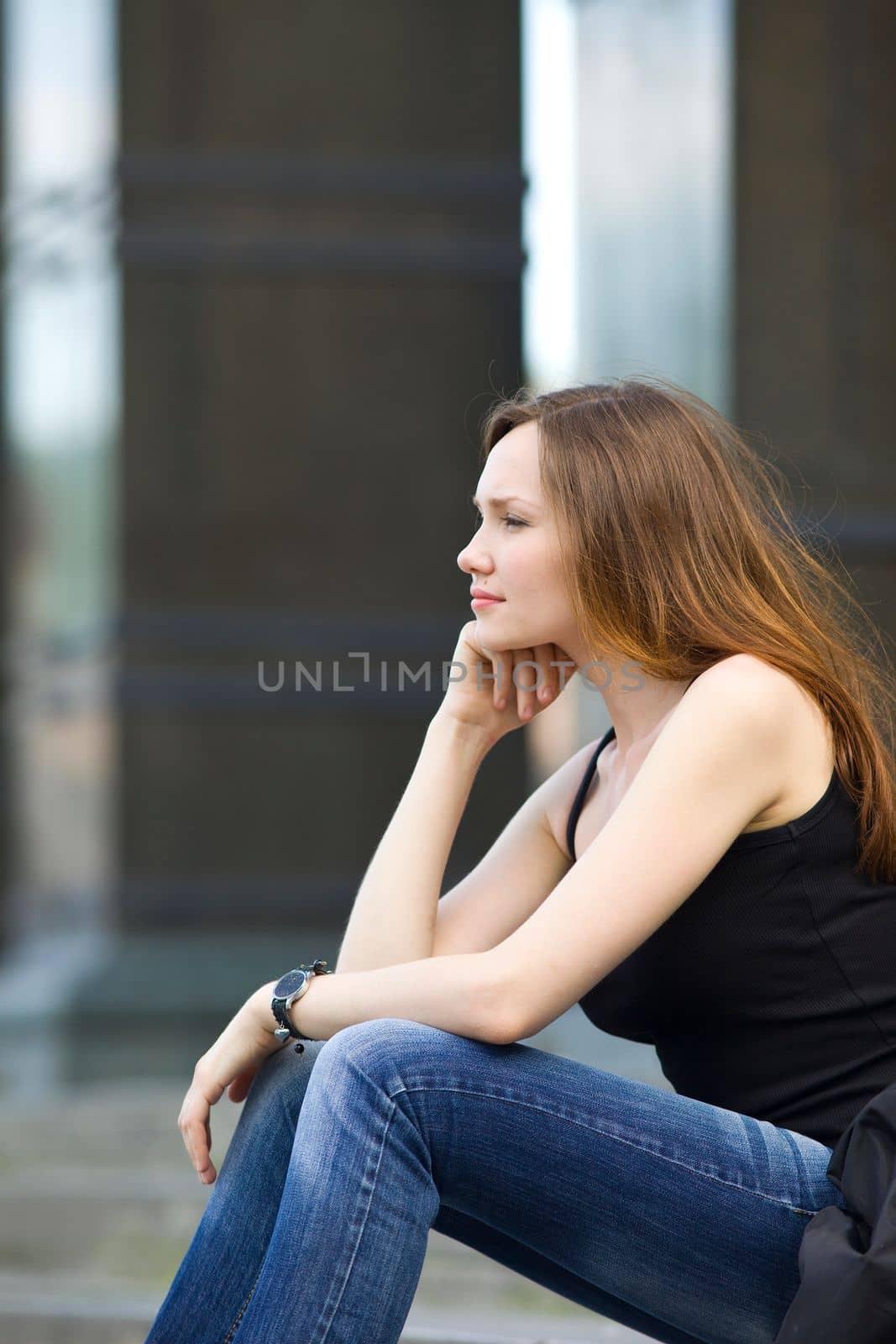 Attractive woman sit on stair look forward