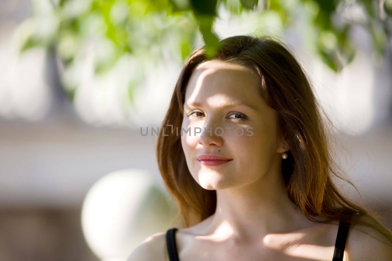 Woman portrait in sunny day look at you