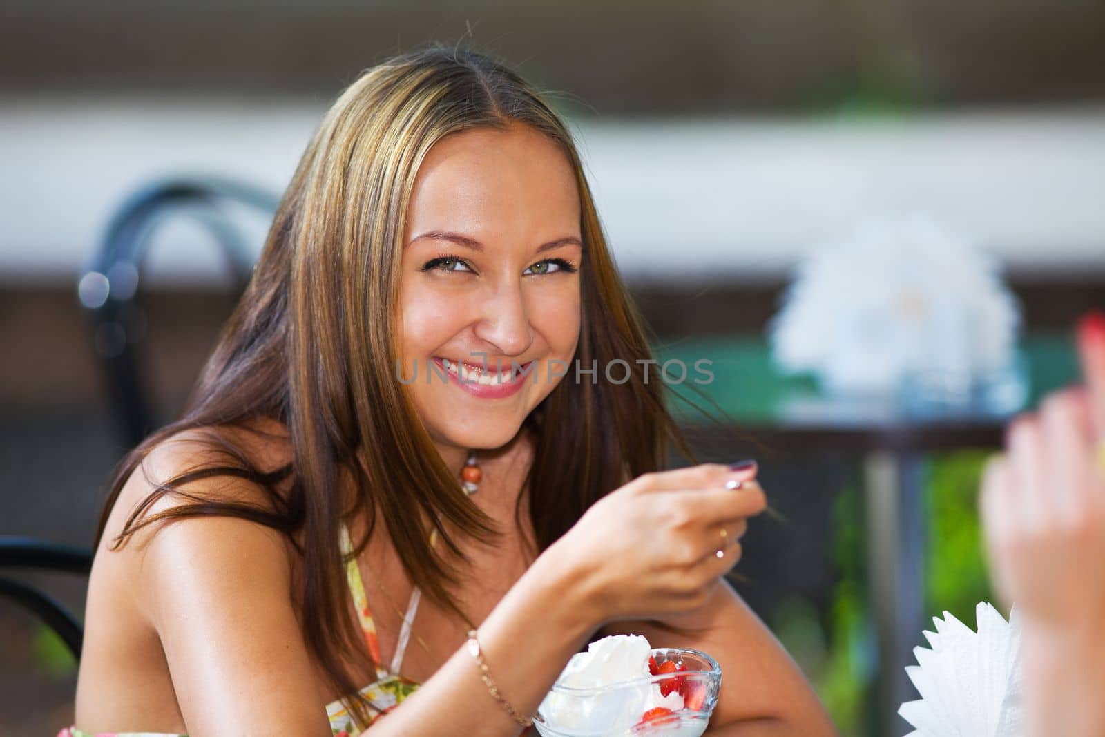 smiling girl eating ice scream look and you
