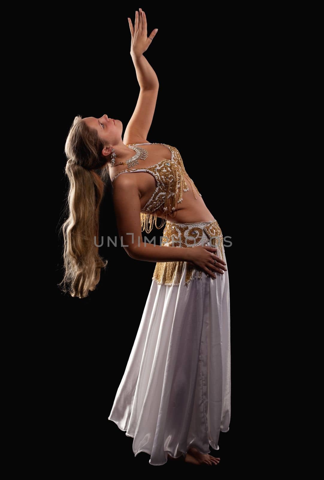 woman dance in dark - oriental arabia costume