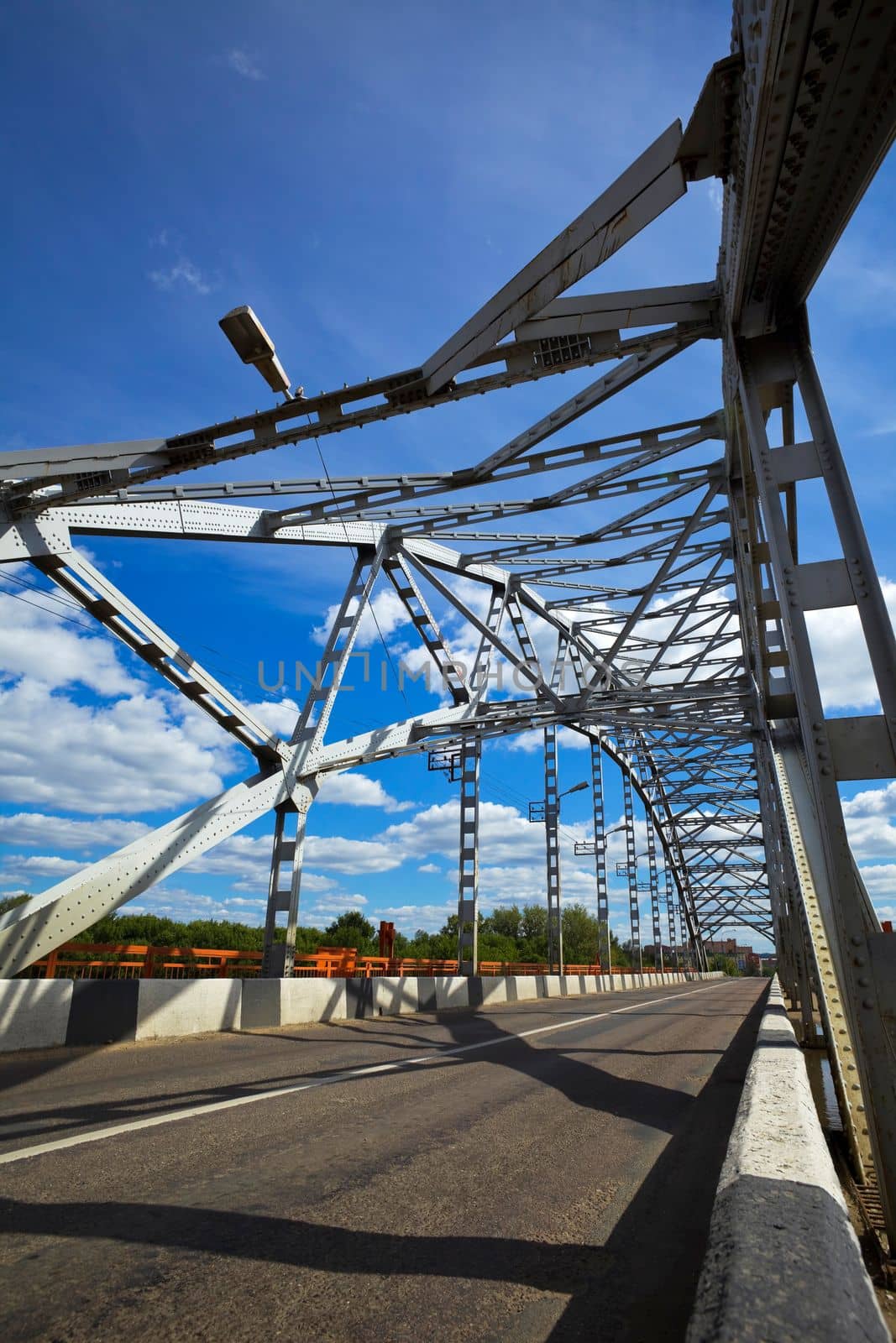 Metal bridge and sky with clouds