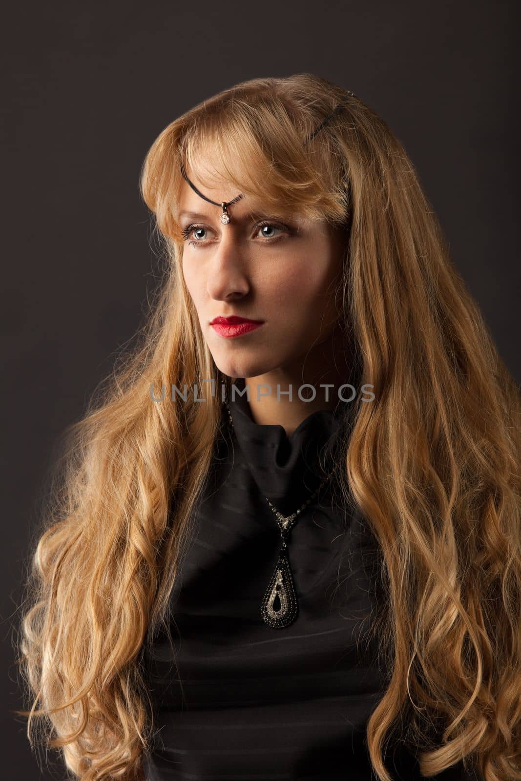 Beautiful woman with long blonde hair by rivertime