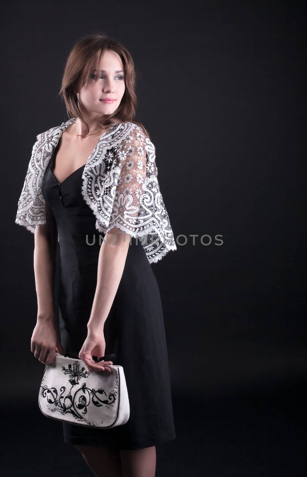 Beauty woman in lacy jacket and handbag with lace