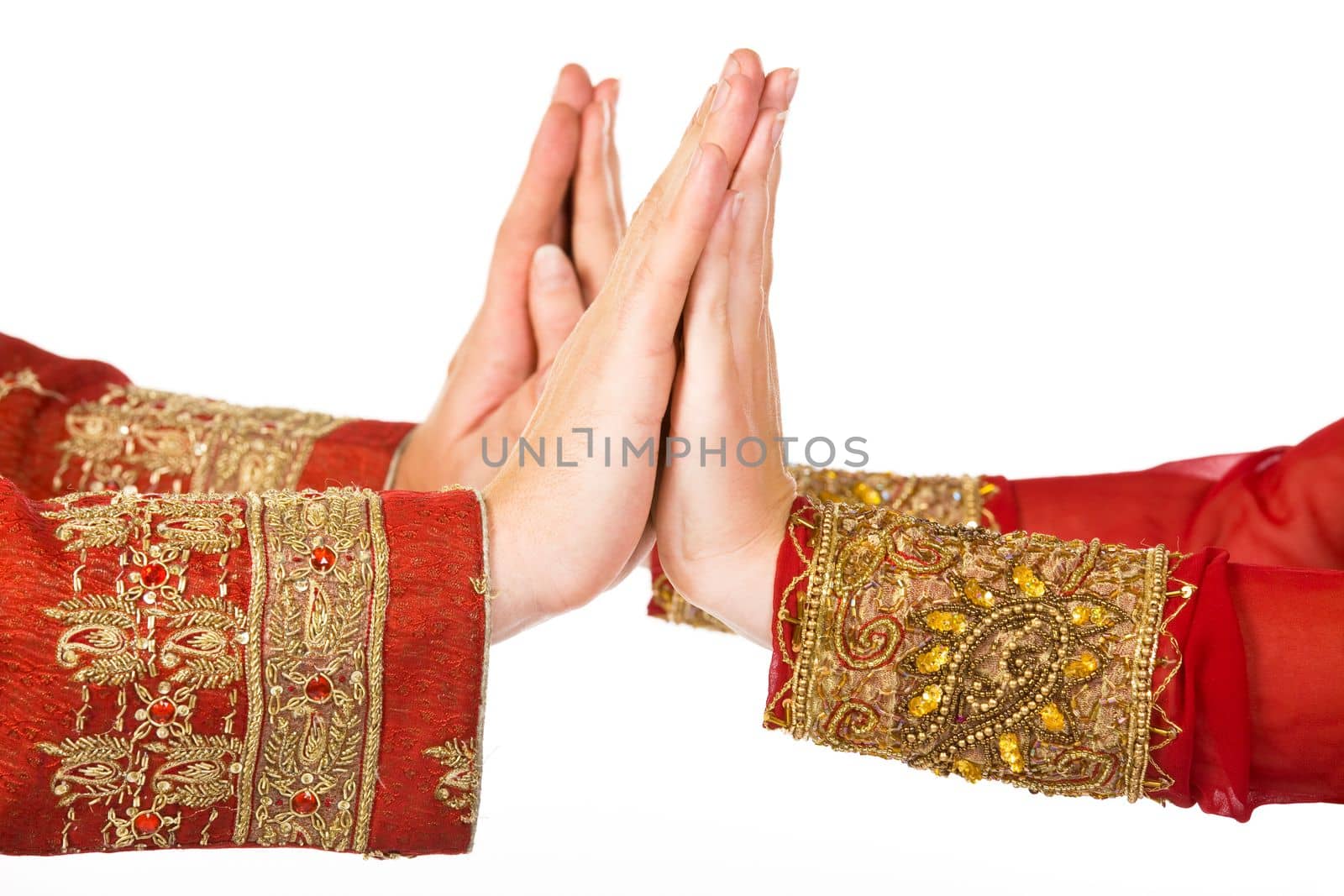 two hands in indian dress man and woman