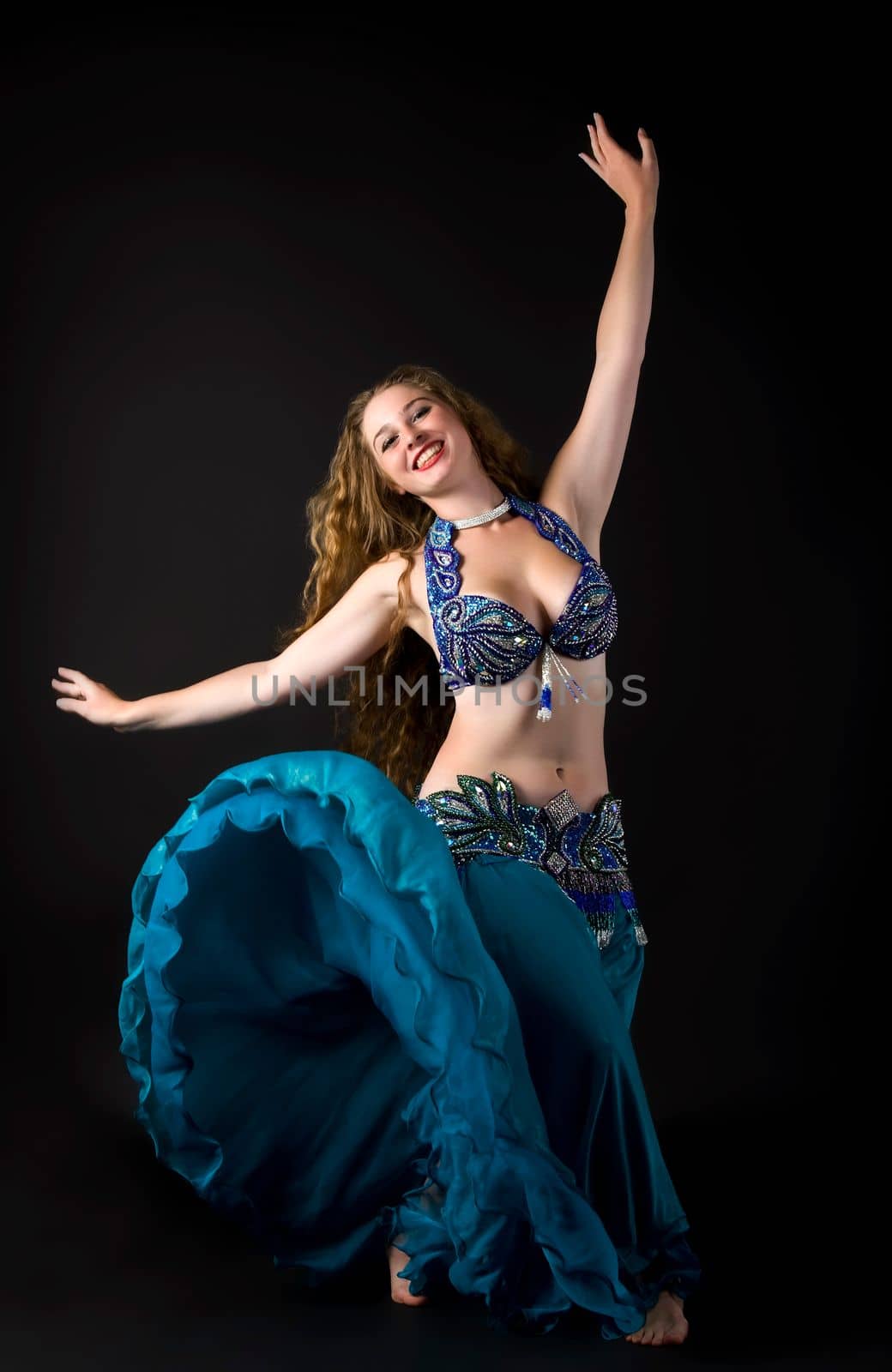 Beauty woman in traditional indian dress dance