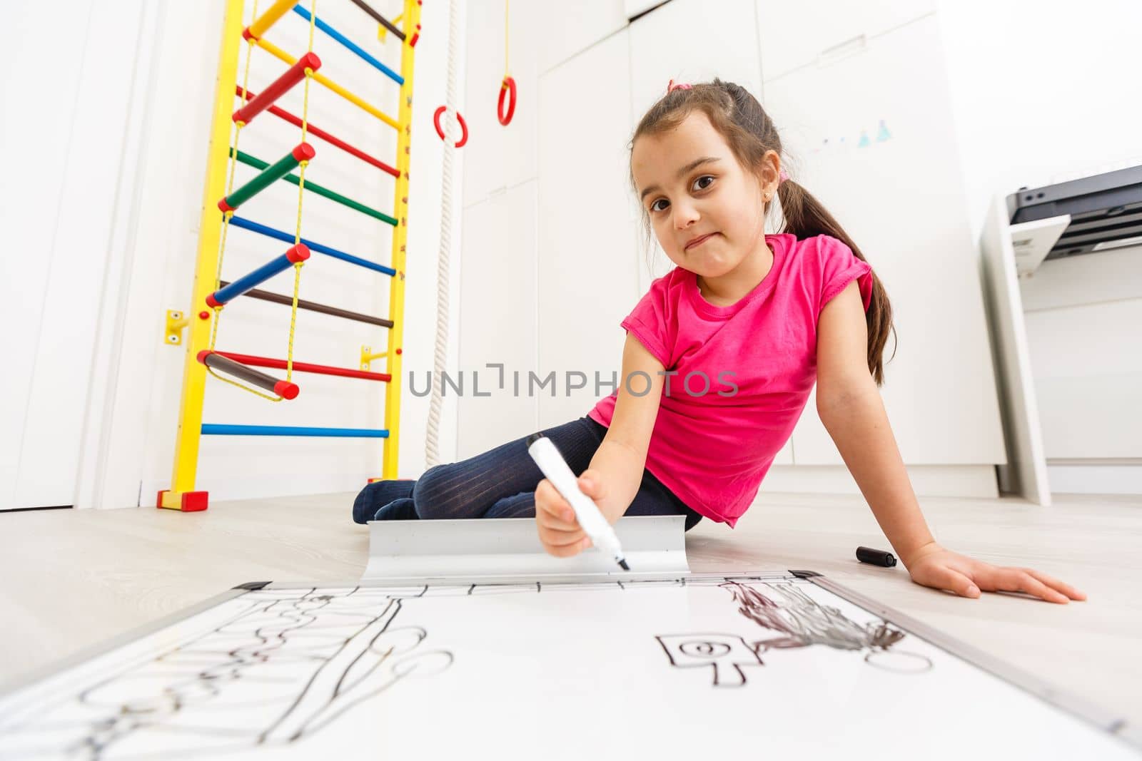 Girl with copy space on empty whiteboard with a marker pen