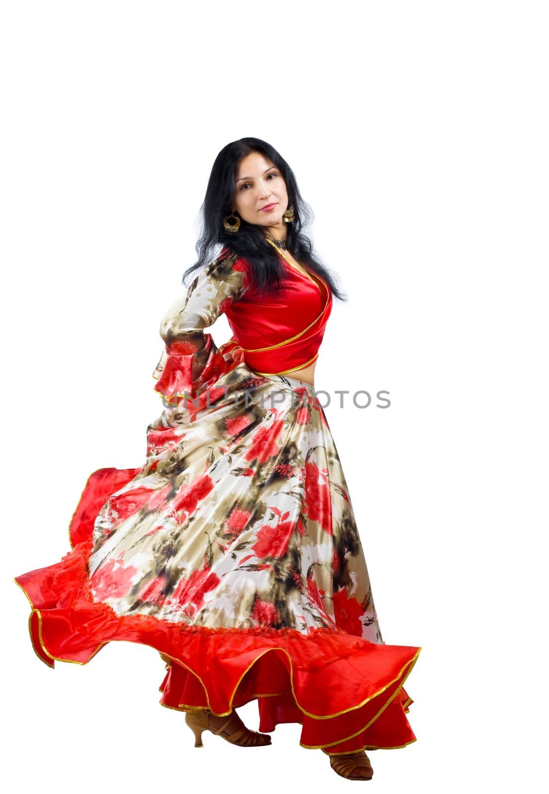 Mature woman dance in gypsy costume isolated