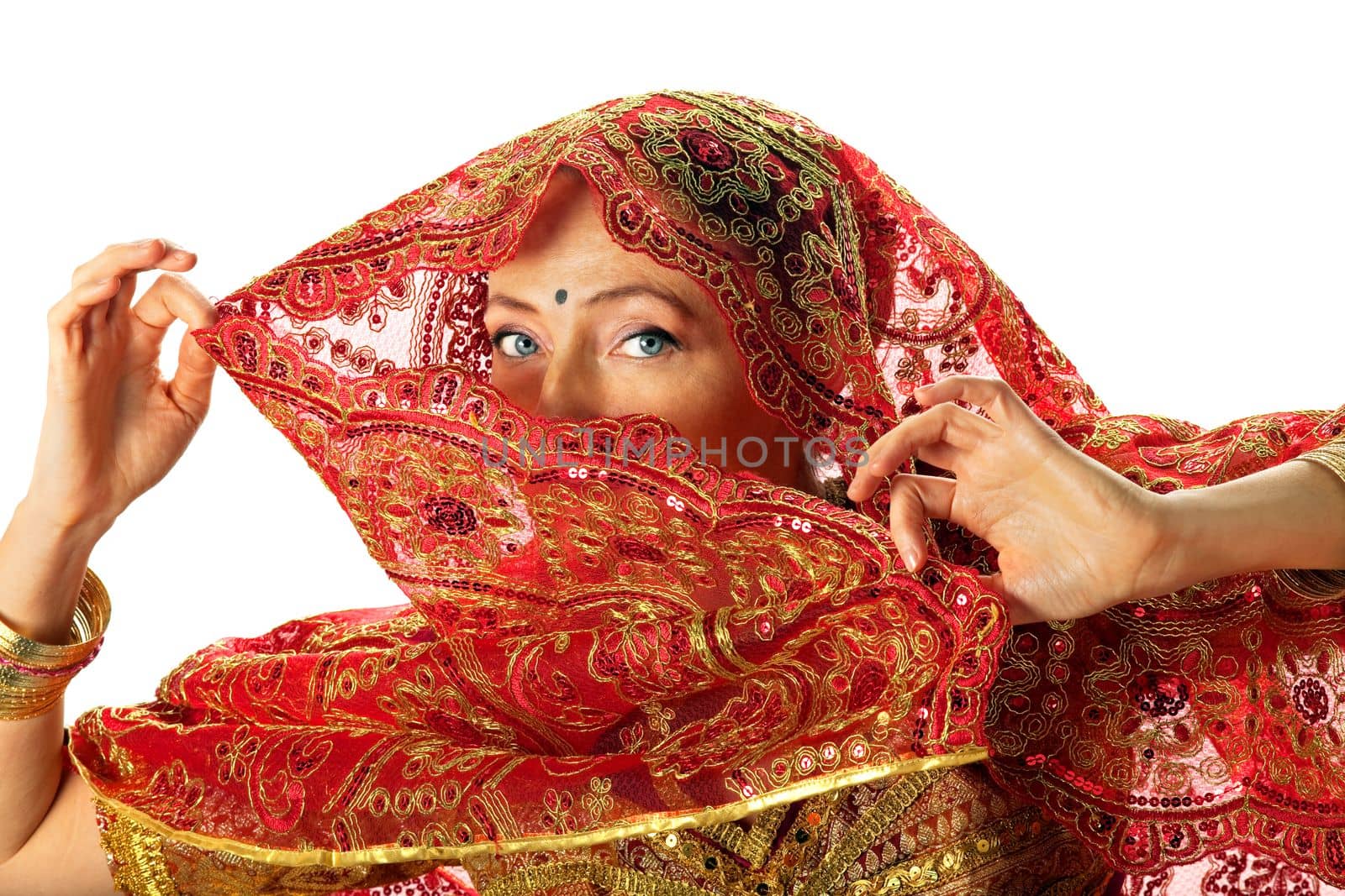 mature woman in traditional rich red indian costume