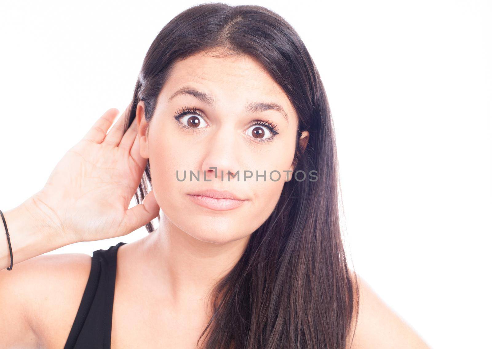 Young woman trying to listen something