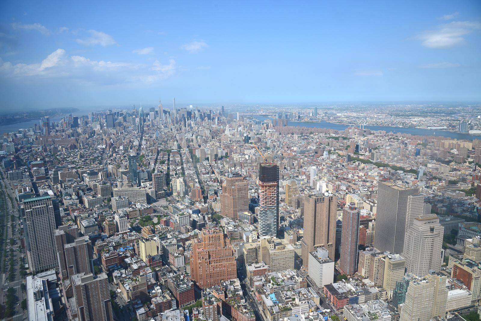 a view of new york downtown as seen from one world trade center observatory deck