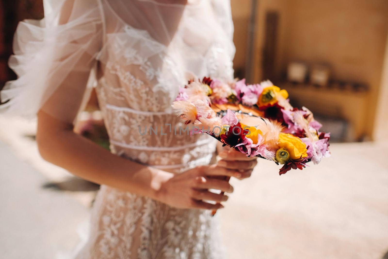 a bride in a wedding dress with a creative bouquet close-up. unusual bouquet in the hands of the bride. France, Provence by Lobachad