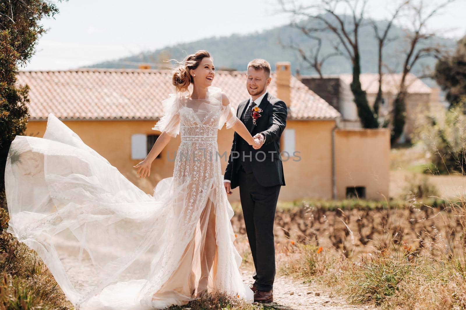 Wedding couple near a Villa in France.Wedding in Provence.Wedding photo shoot in France by Lobachad