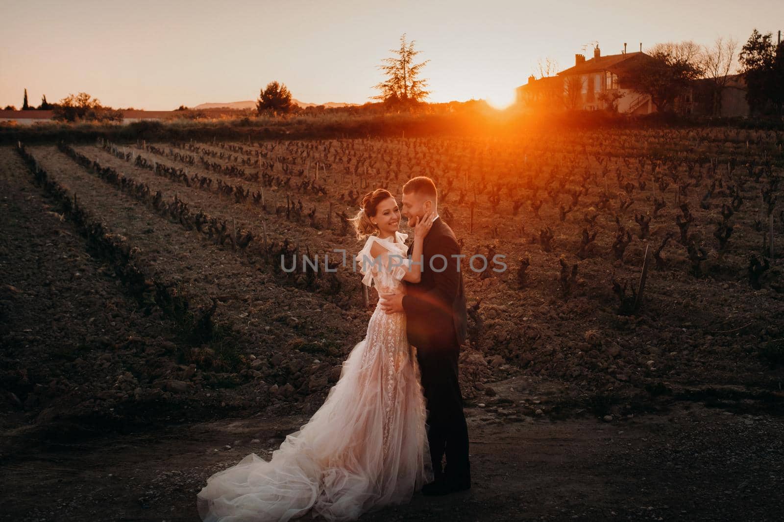 Wedding couple at sunset in France.Wedding in Provence.Wedding photo shoot in France by Lobachad