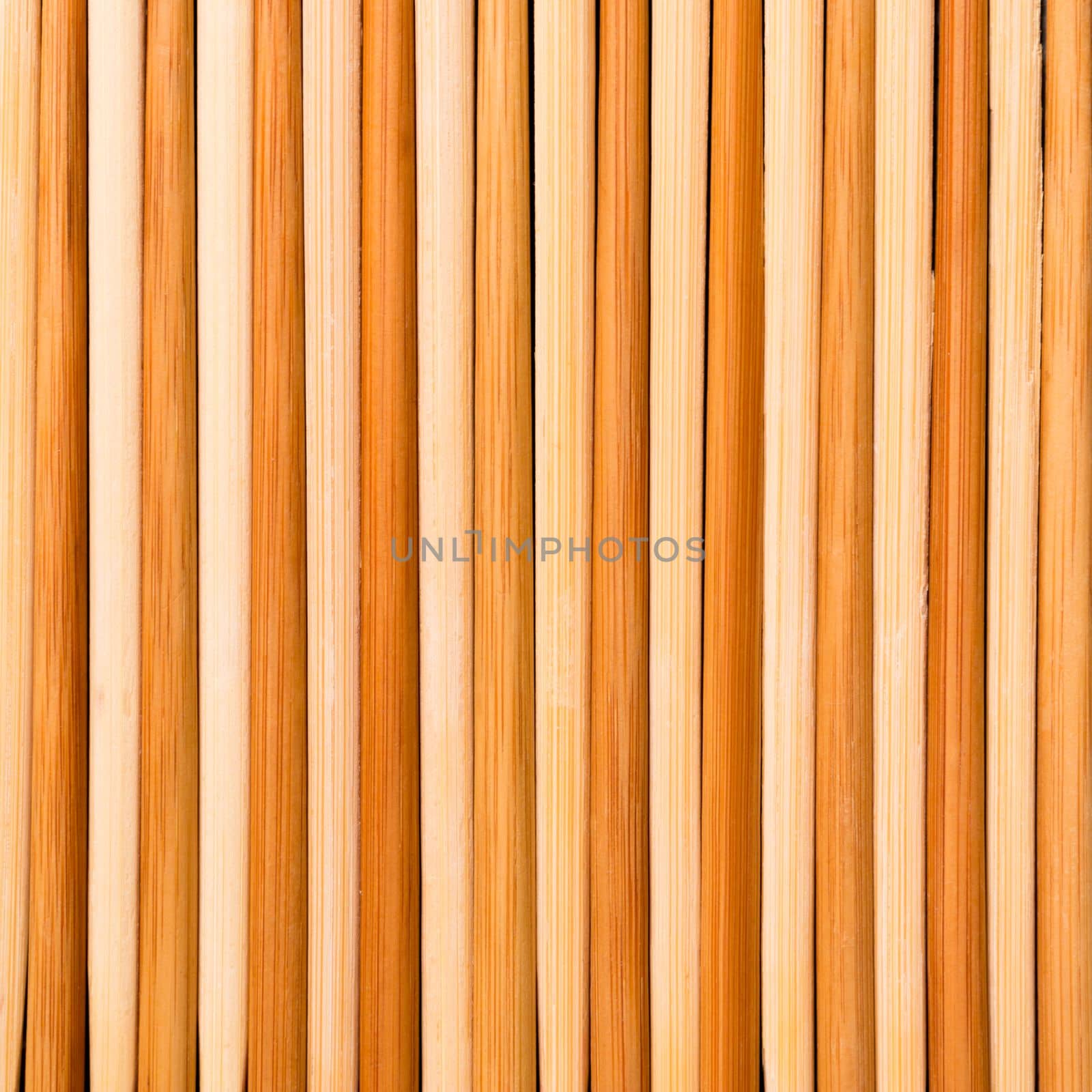 Close up a lot of chopsticks made of bamboo. Top view.