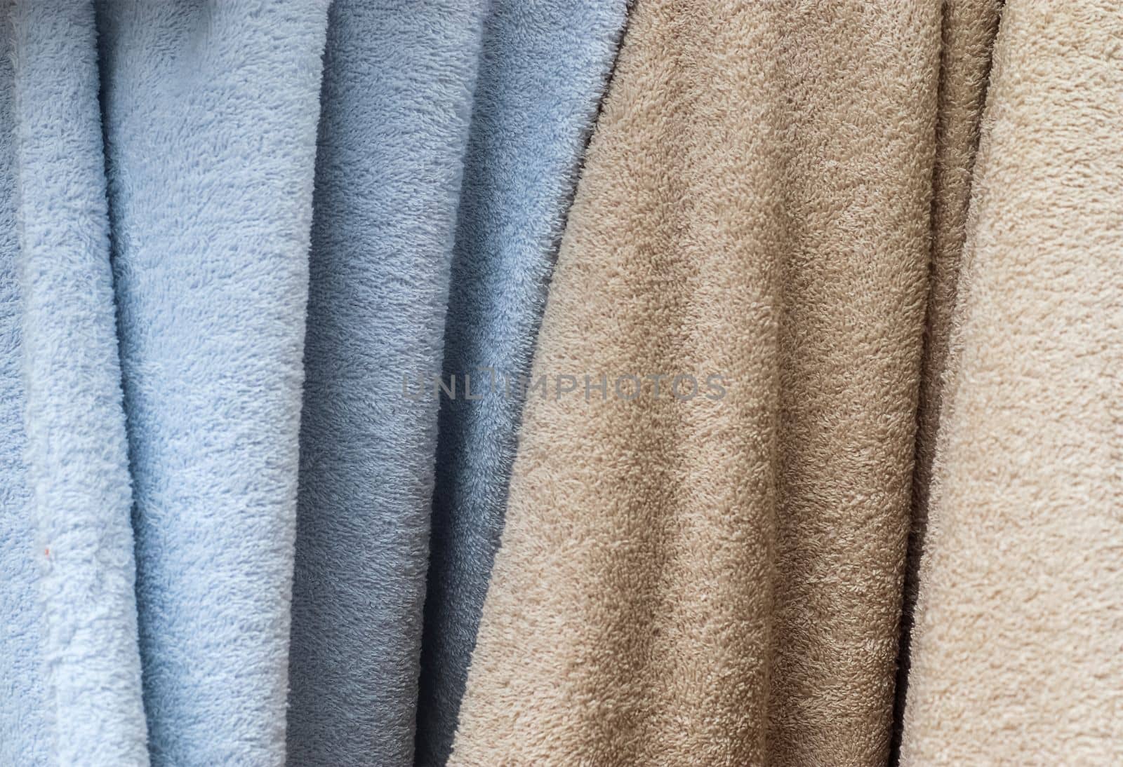 Samples of cloth and fabrics in different colors found at a fabrics market by MP_foto71