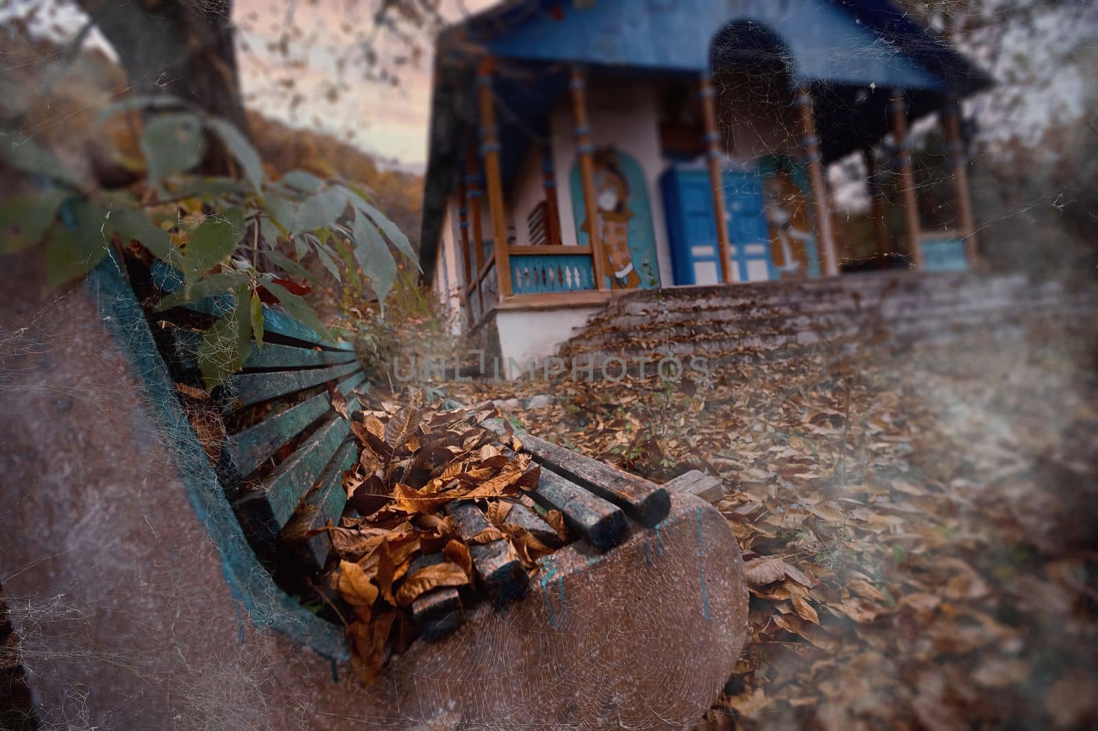  Lost place. Abandoned sanatorium. Cobweb on a bench, autumn fog. Broken house. High quality photo