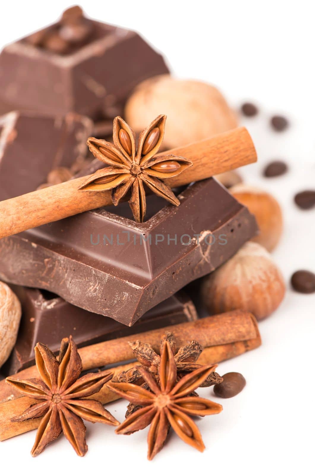 chocolate bars with its ingredients isolated on white background by aprilphoto