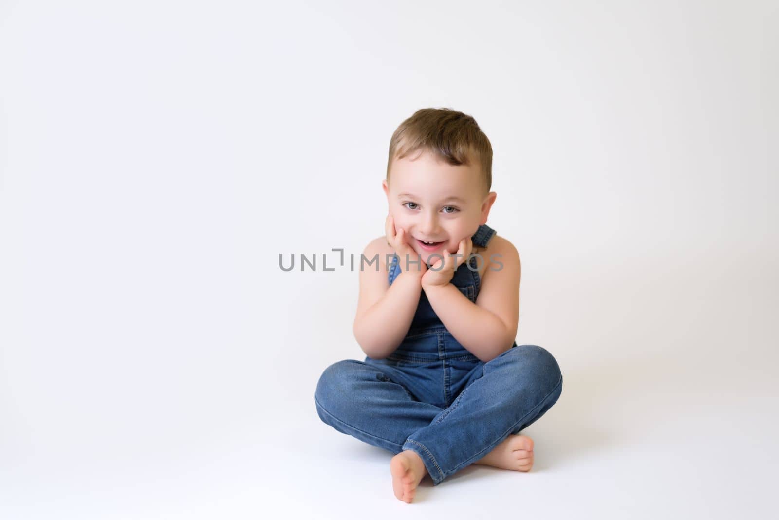 Happy child - isolated over a white background by jcdiazhidalgo