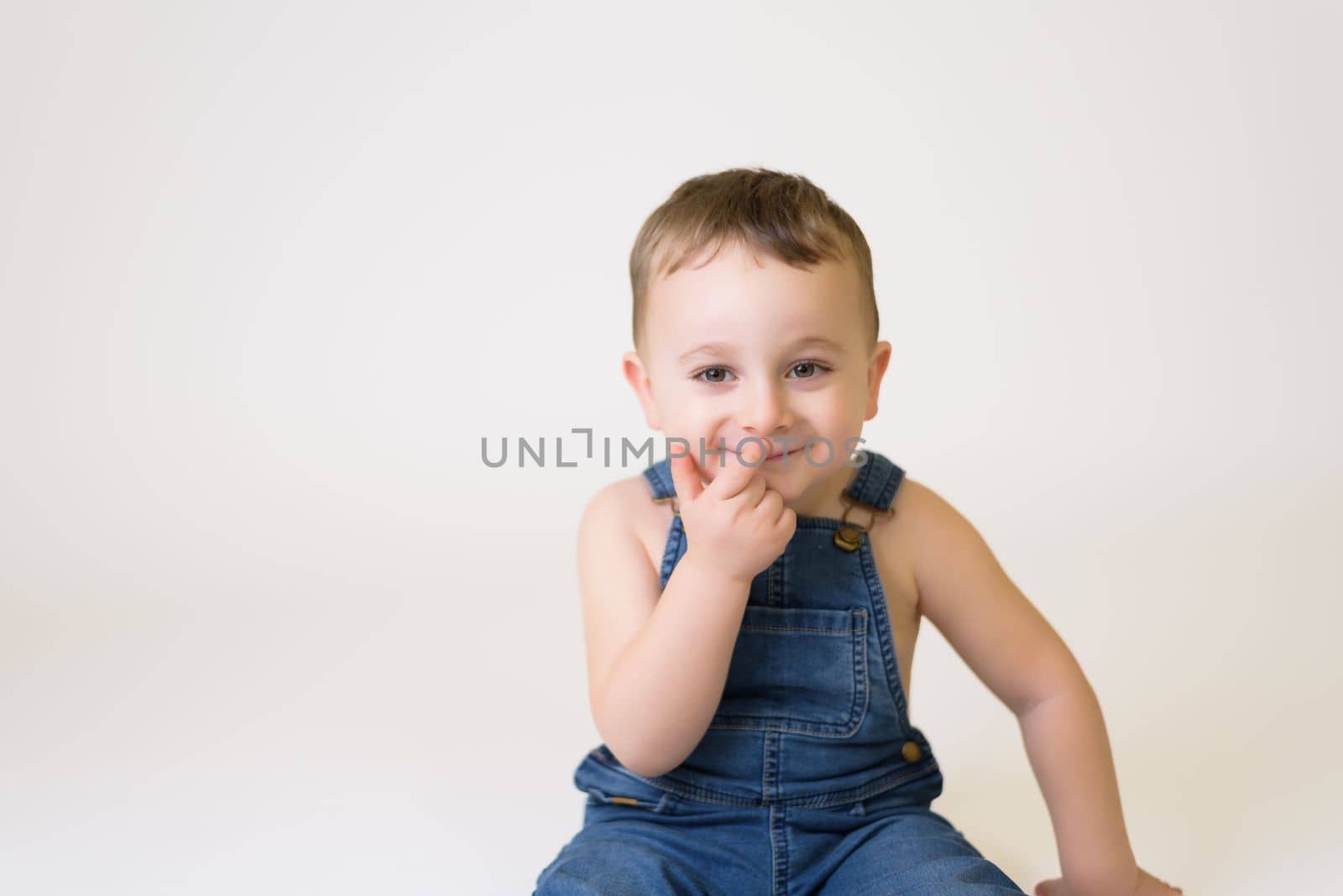 Happy child - isolated over a white background.