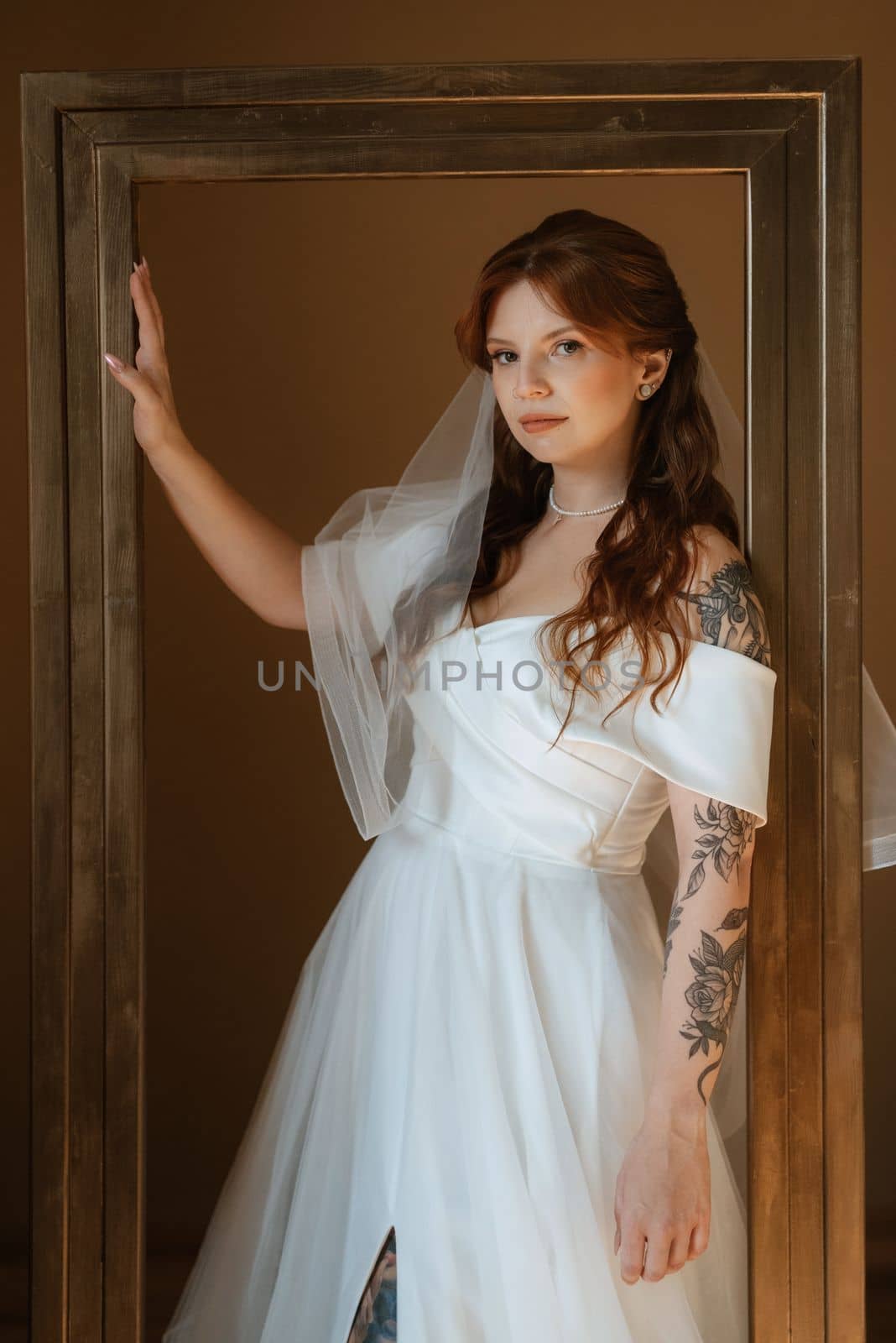 portrait of a bride girl with red hair in a white wedding dress by Andreua