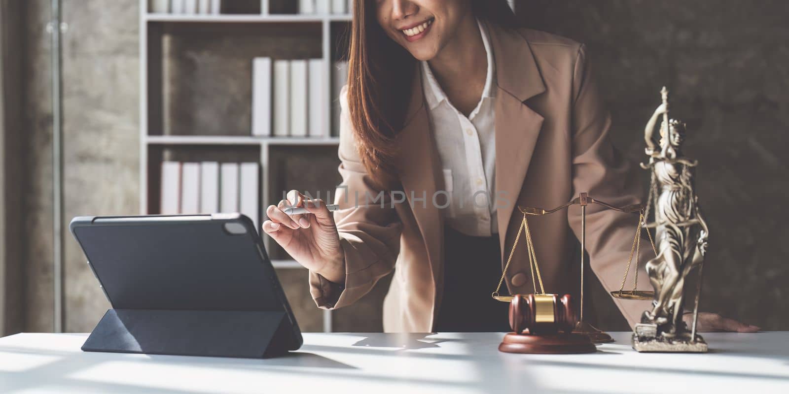 Lawyer working at office. Asian Lawyer doing with contract or document in office. Law, legal services, advice, Justice and real estate concept.