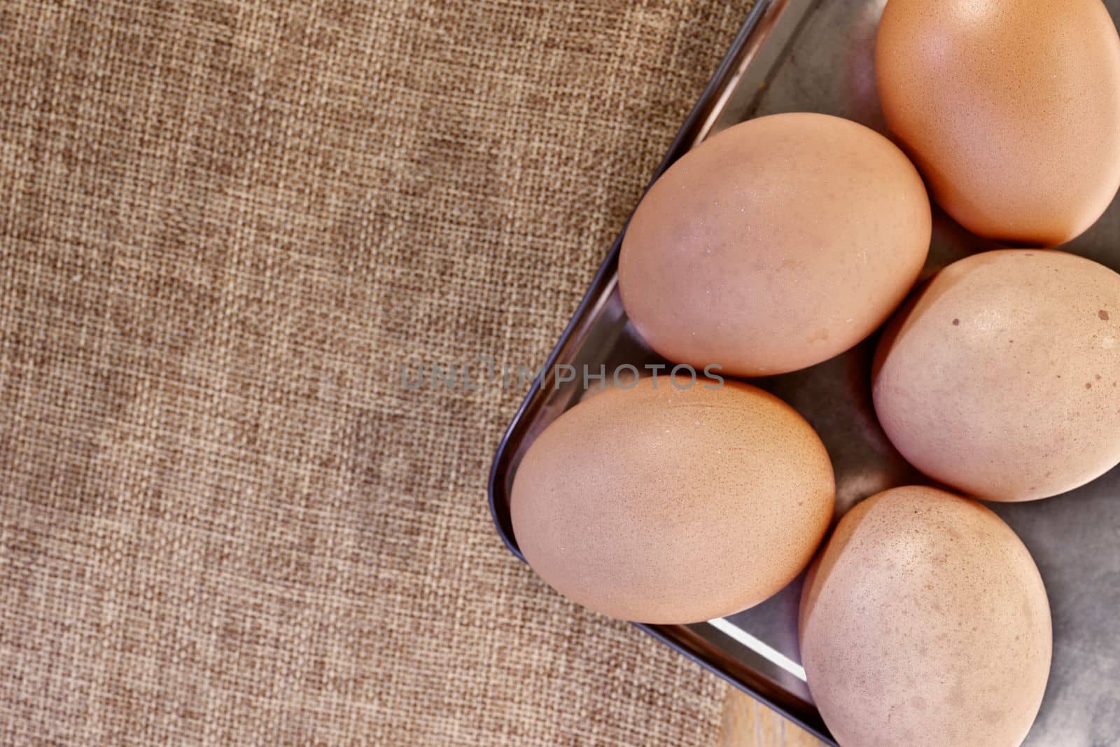 Raw eggs in tray by victimewalker