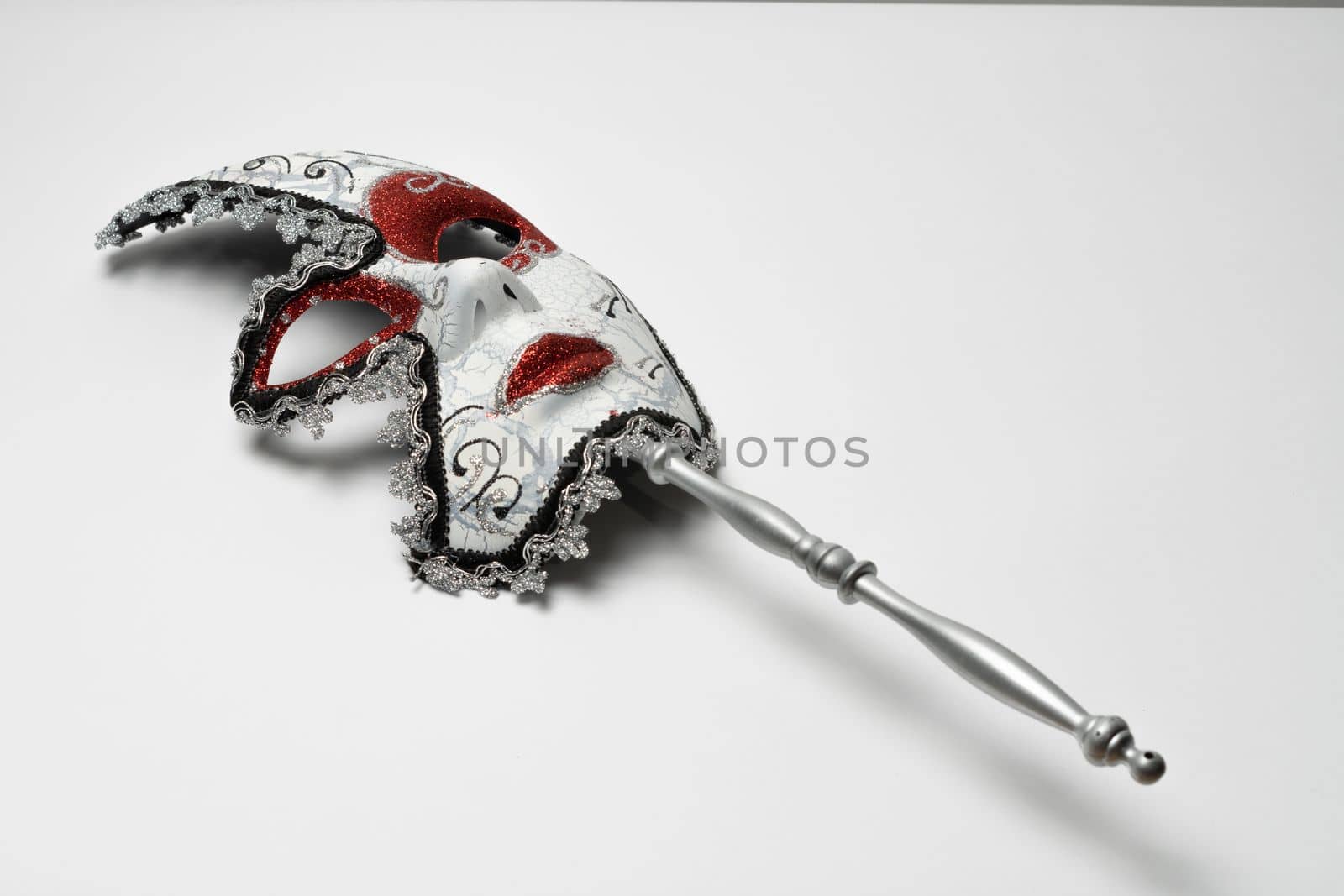 venetian carnival mask on white background close-up and copy space