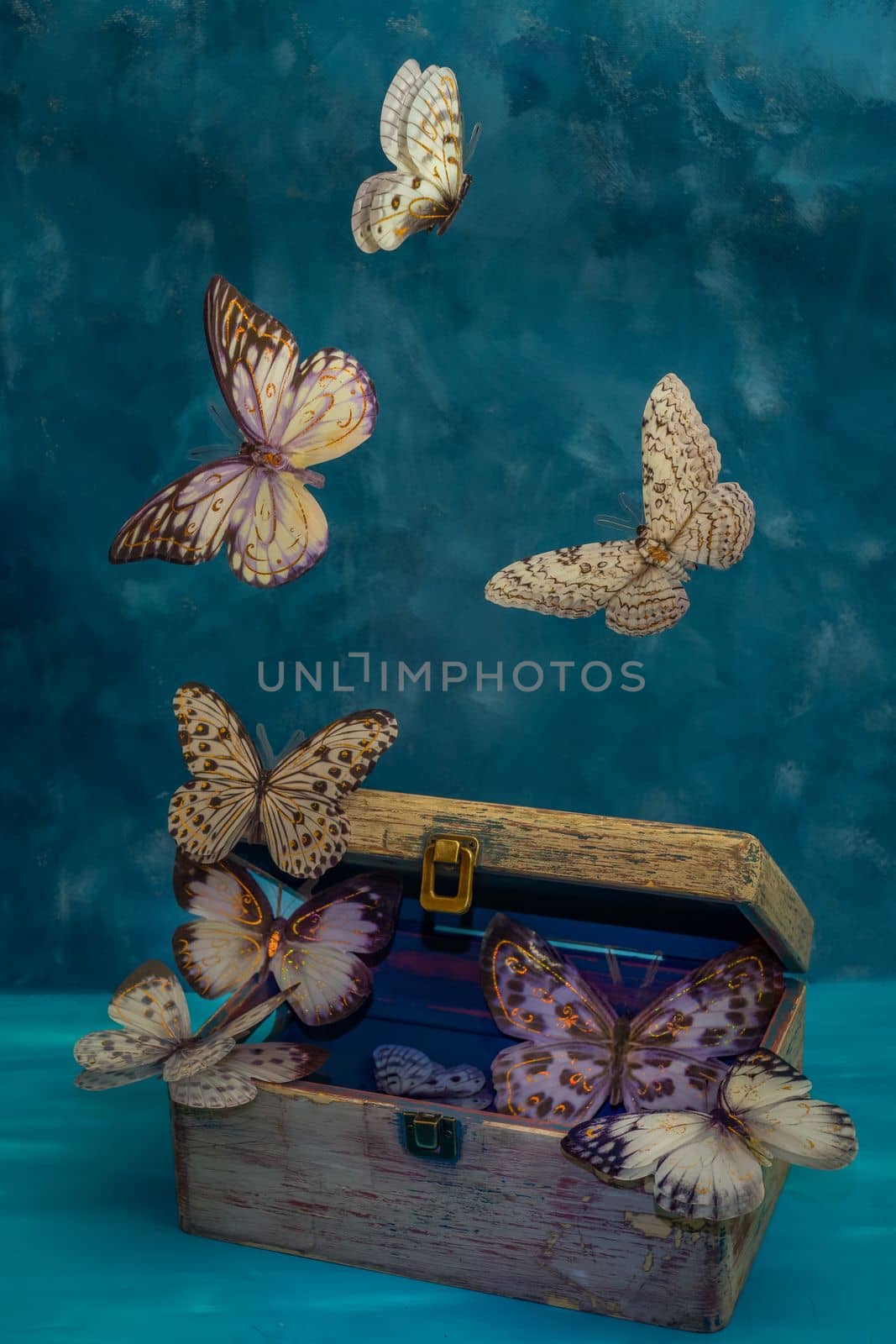artificial butterflies flying on a blue background