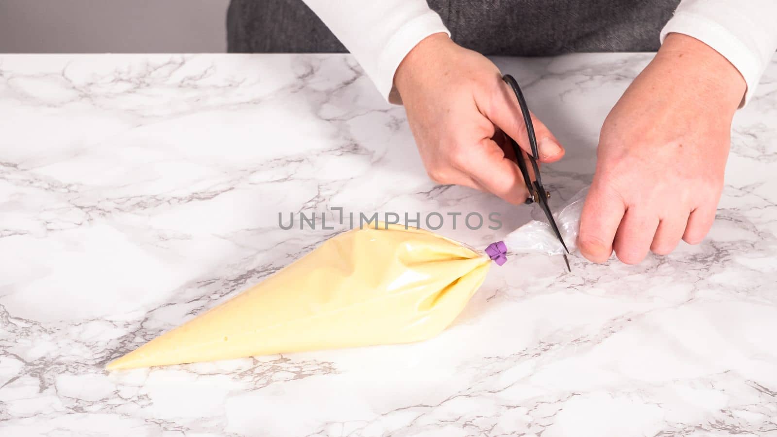 Step by step. Transferring pancake batter into a piping bag to prepare mini pancake cereal.