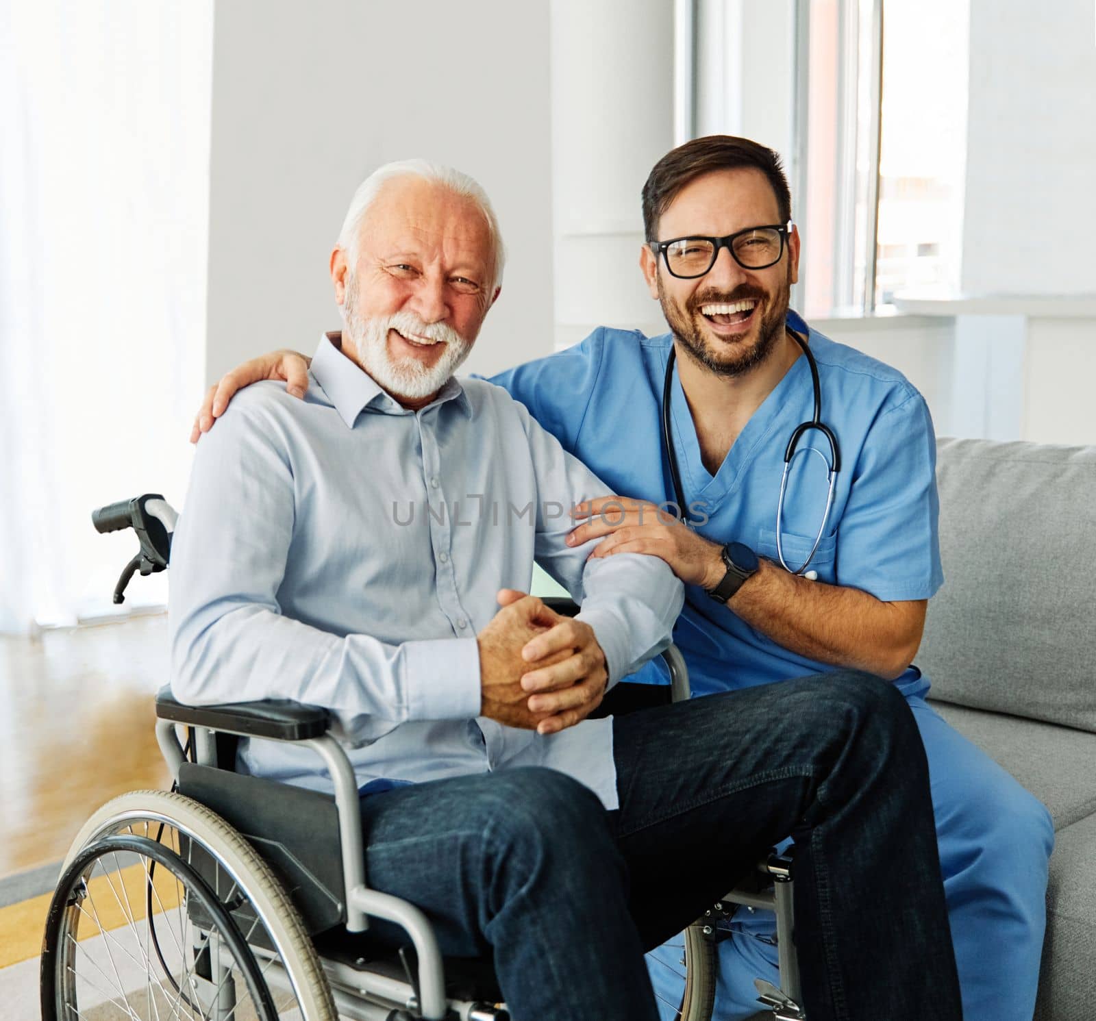 Doctor or nurse caregiver helping senior man in a wheelchair at home or nursing home