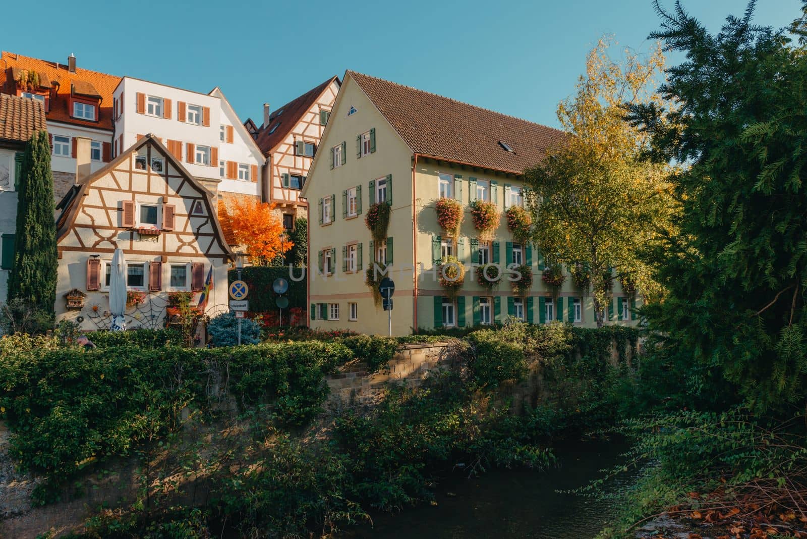 Old national German town house. Old Town is full of colorful and well preserved buildings. Baden-Wurttemberg is a state in southwest Germany bordering France and Switzerland. The Black Forest, known for its evergreen scenery and traditional villages, lies in the mountainous southwest. Stuttgart, the capital, is home to Wilhelma, a royal estate turned zoo and gardens. Porsche and Mercedes-Benz have headquarters and museums there. The 19th-century Hohenzollern Castle sits in the Swabian Alps to the south.