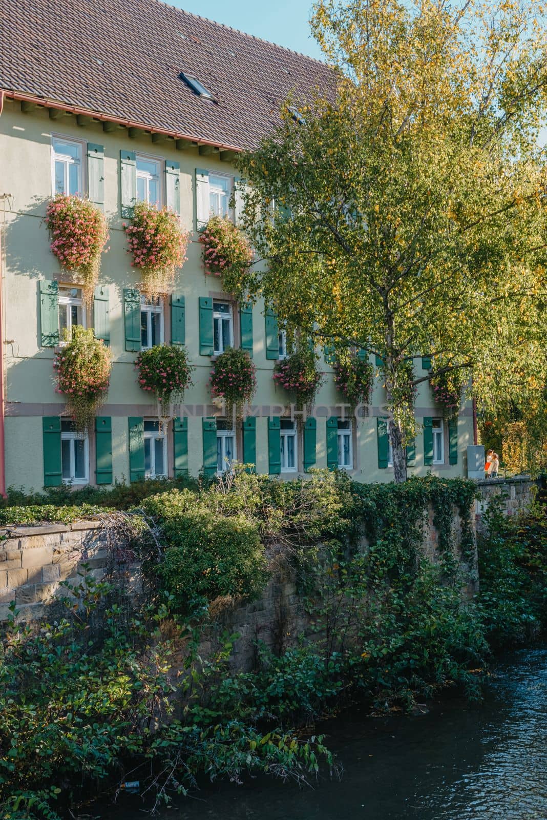 Old national German town house. Old Town is full of colorful and well preserved buildings. Baden-Wurttemberg is a state in southwest Germany bordering France and Switzerland. The Black Forest, known for its evergreen scenery and traditional villages, lies in the mountainous southwest. Stuttgart, the capital, is home to Wilhelma, a royal estate turned zoo and gardens. Porsche and Mercedes-Benz have headquarters and museums there. The 19th-century Hohenzollern Castle sits in the Swabian Alps to the south.