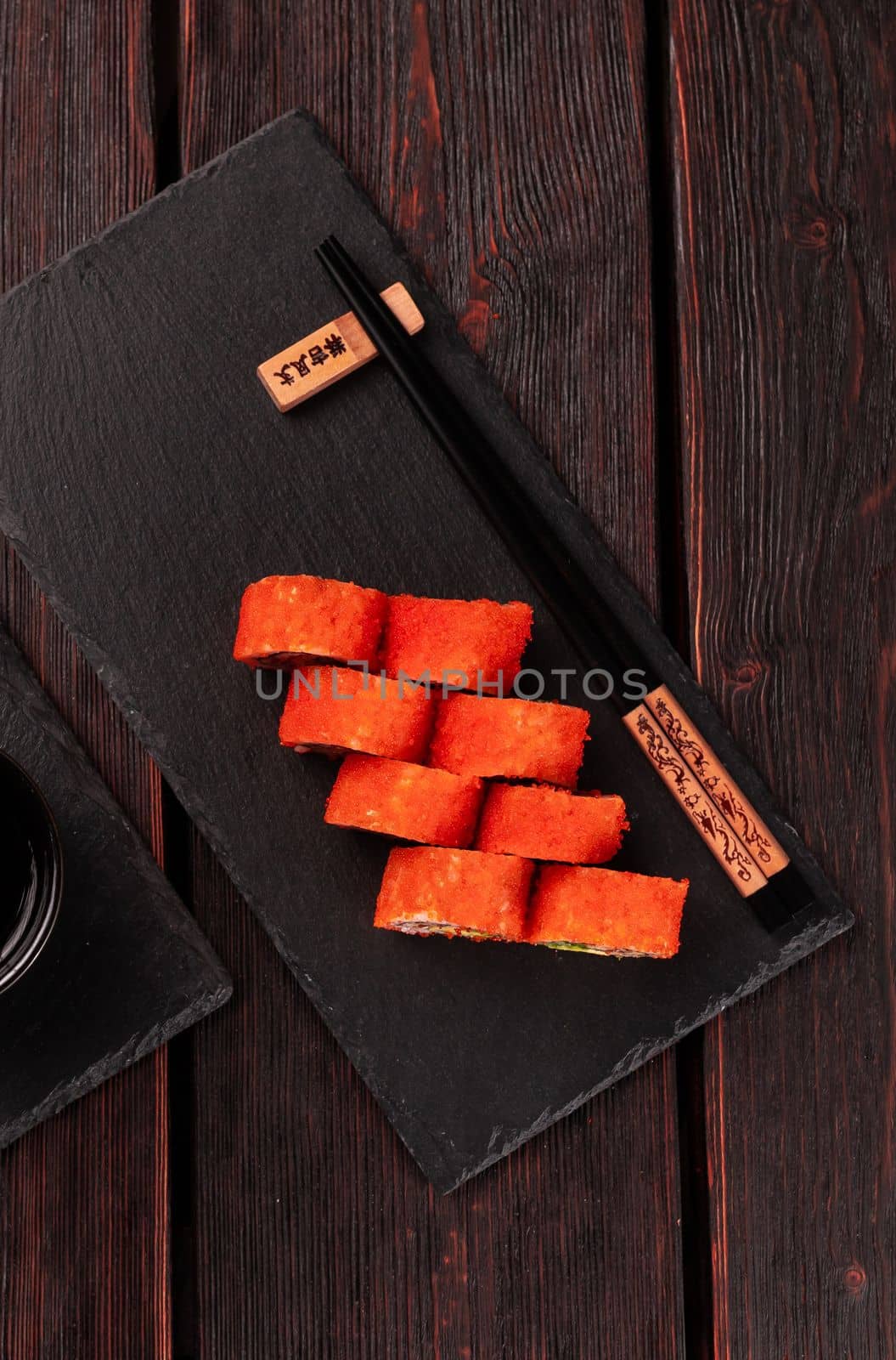 Roll with fish sushi with chopsticks top view - asian food concept by Satura86