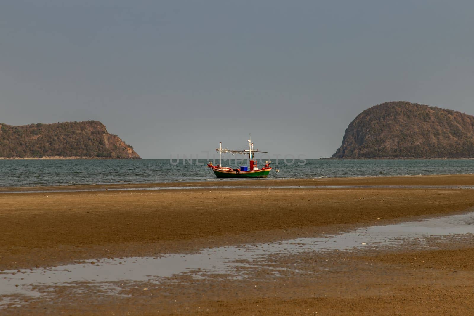 Thai fishing boat used as a vehicle for finding fish in the sea. Selective focus.