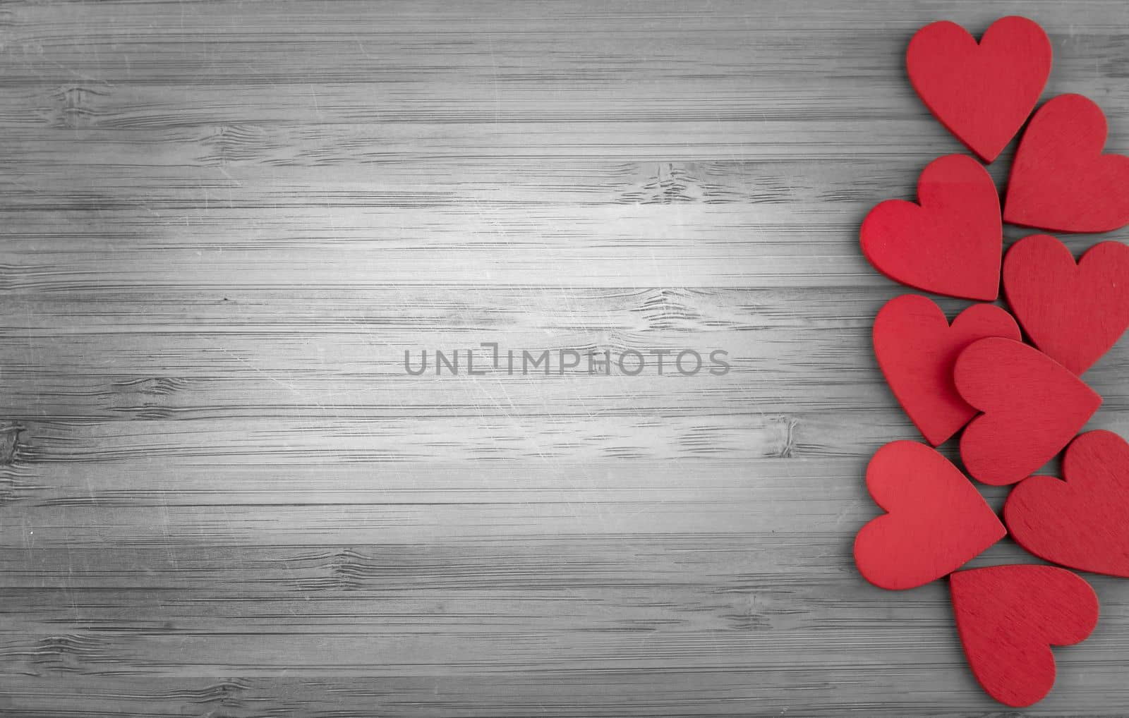 red wooden hearts on wooden background by Kondrateva